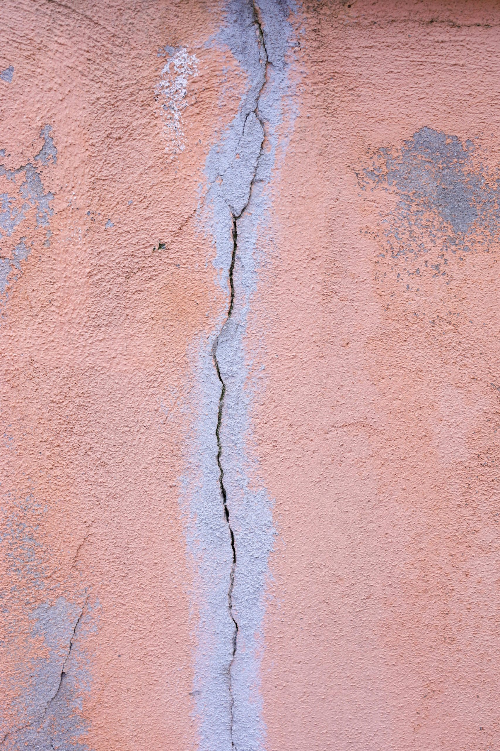 Fissures crépi maison réparation
