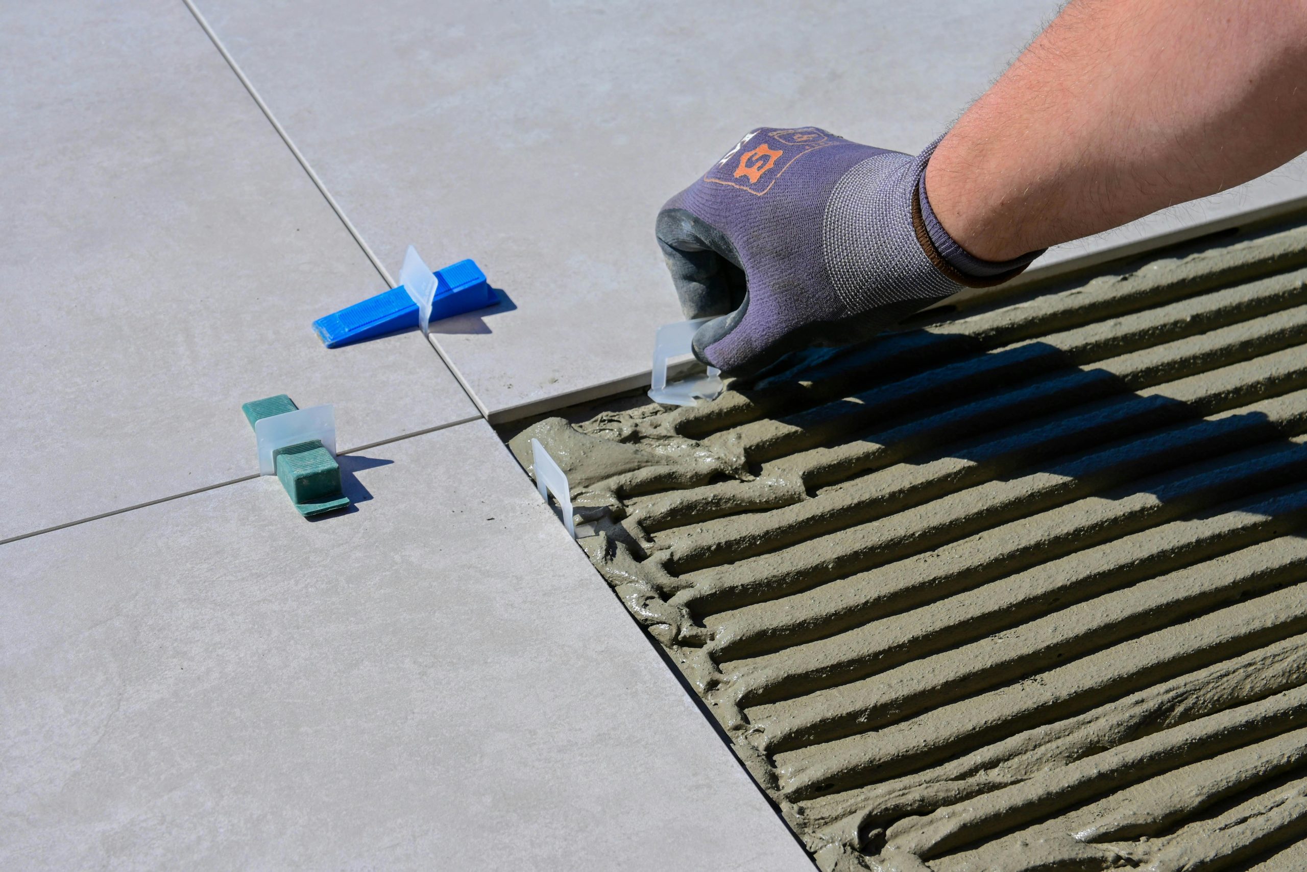 Techniques pose carrelage dénivelé